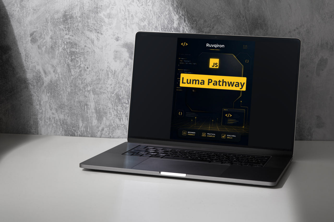 Laptop displaying 'Luma Pathway' on a gray surface with a textured wall background